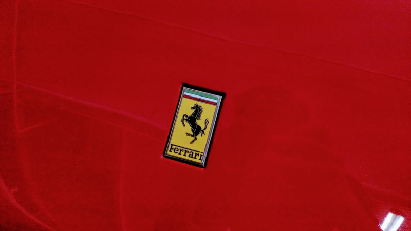Hood emblem from Ferrari 512 BBi for your time.